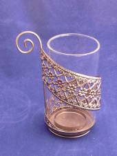 Glass tea light/votive holder copper base